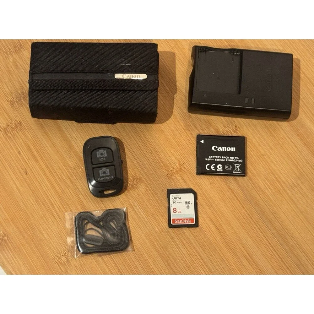 Canon PowerShot ELPH 135 16MP Digital Camera Silver Battery, Charger Etc. Clean